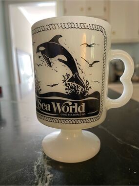 Vintage 1980 Sea World Milk Glass Pedestal Mug Orca Dolphin Coffee Cup
